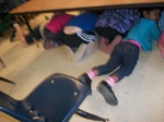 This is what a preschool Shakeout drill is supposed to look like: only feet and bottoms are visible! :)